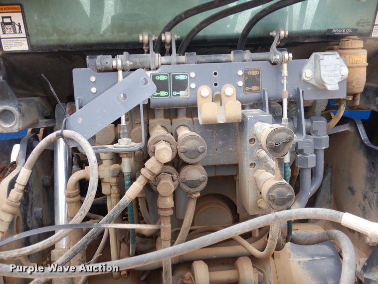 image for item DH8983 2001 New Holland TV140  bi-directional tractor