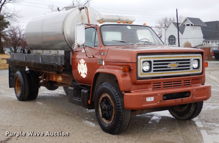 image for item JJ9215 1979 Chevrolet C70  flatbed truck with water tank