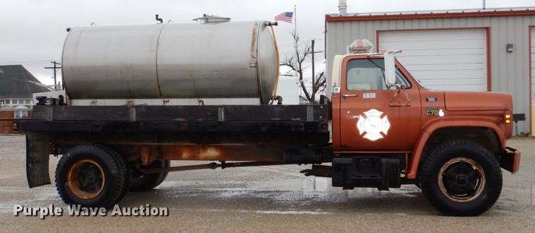 image for item JJ9215 1979 Chevrolet C70  flatbed truck with water tank