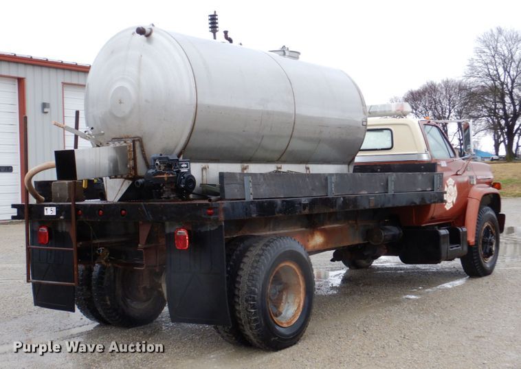 image for item JJ9215 1979 Chevrolet C70  flatbed truck with water tank