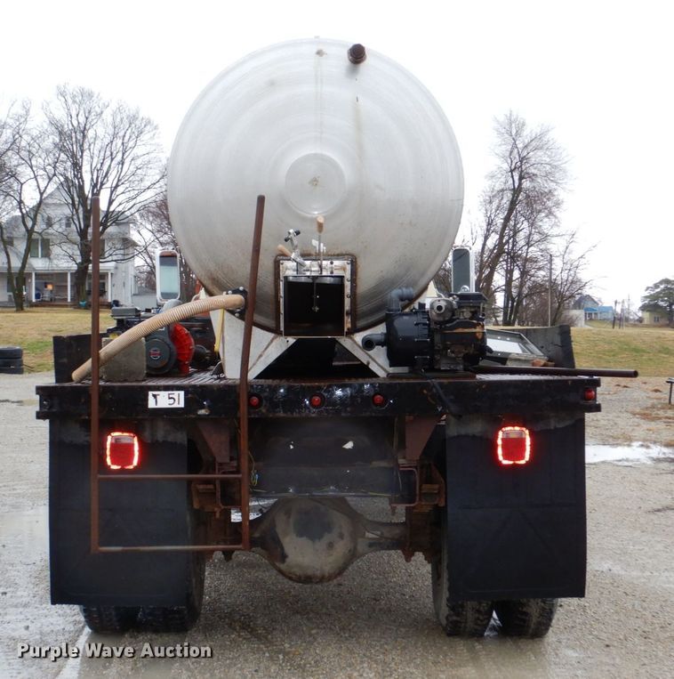 image for item JJ9215 1979 Chevrolet C70  flatbed truck with water tank