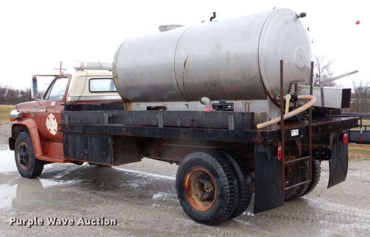 image for item JJ9215 1979 Chevrolet C70  flatbed truck with water tank