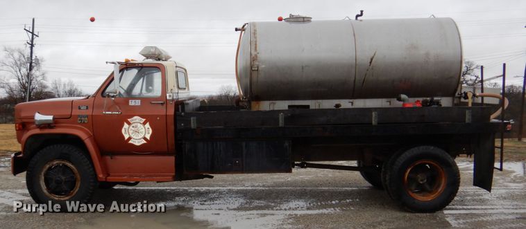 image for item JJ9215 1979 Chevrolet C70  flatbed truck with water tank