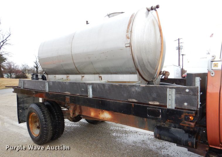 image for item JJ9215 1979 Chevrolet C70  flatbed truck with water tank