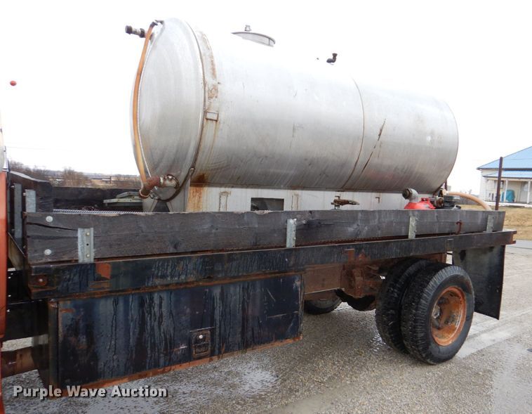 image for item JJ9215 1979 Chevrolet C70  flatbed truck with water tank
