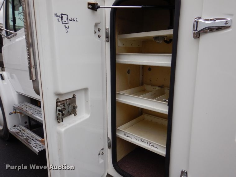 image for item JK9489 2001 Freightliner FL70  bucket truck