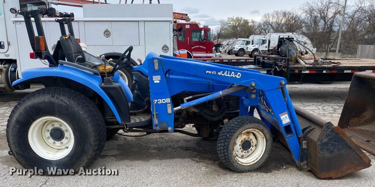 image for item JL9074 2003 New Holland TC335  MFWD tractor