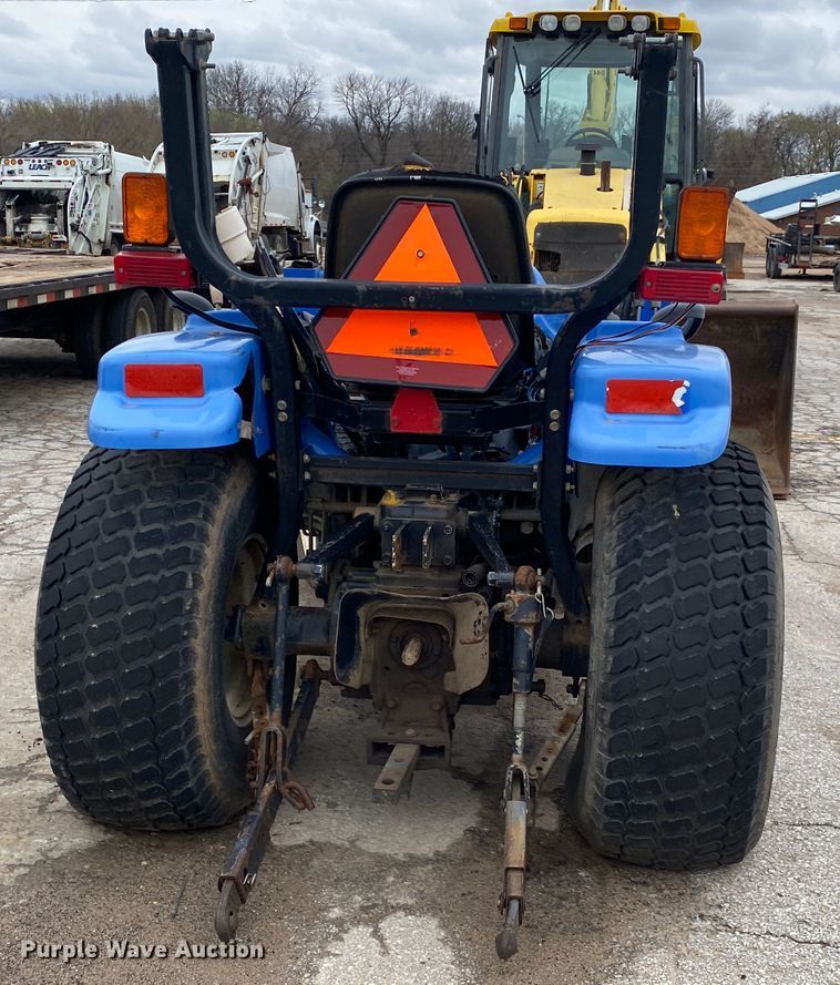 image for item JL9074 2003 New Holland TC335  MFWD tractor