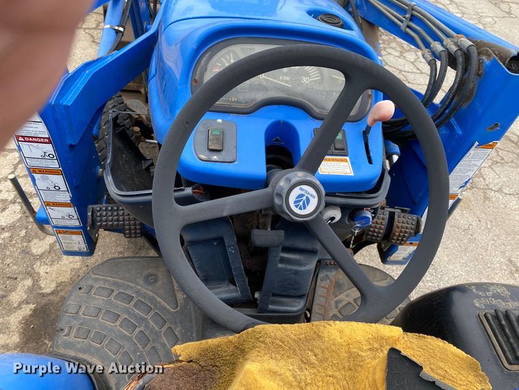 image for item JL9074 2003 New Holland TC335  MFWD tractor