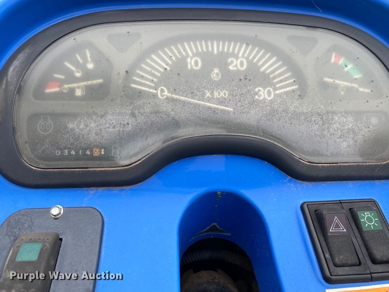 image for item JL9074 2003 New Holland TC335  MFWD tractor