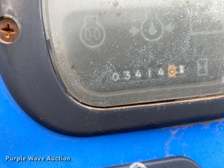 image for item JL9074 2003 New Holland TC335  MFWD tractor