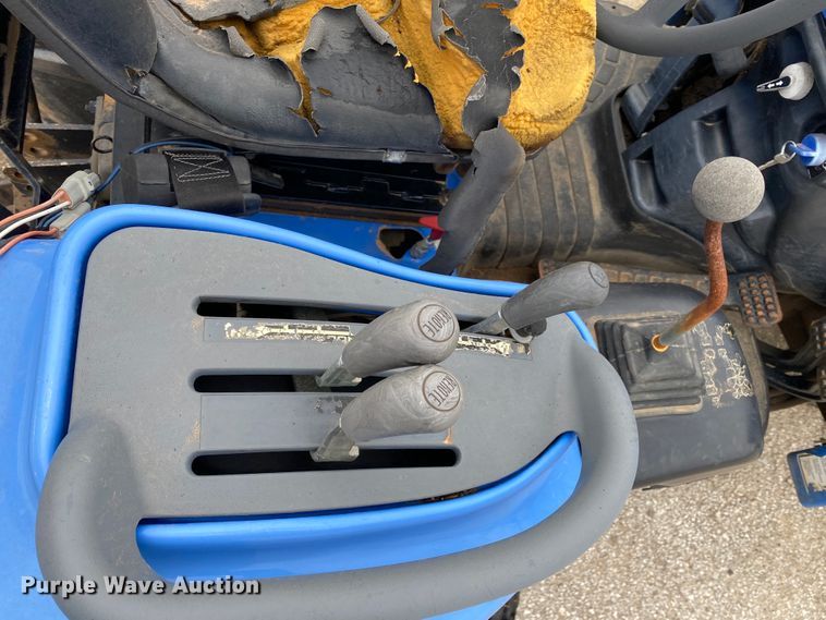 image for item JL9074 2003 New Holland TC335  MFWD tractor