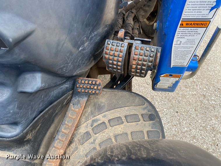 image for item JL9074 2003 New Holland TC335  MFWD tractor