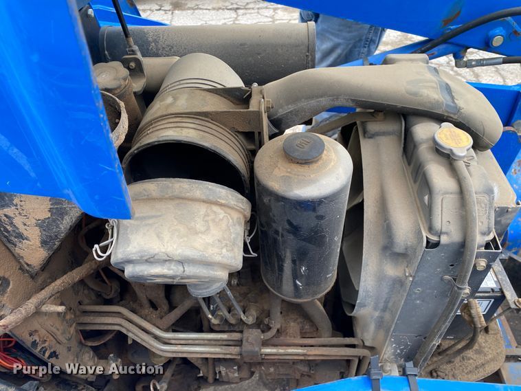 image for item JL9074 2003 New Holland TC335  MFWD tractor