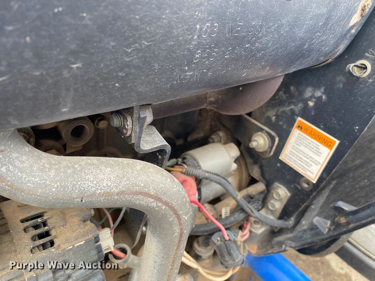 image for item JL9074 2003 New Holland TC335  MFWD tractor