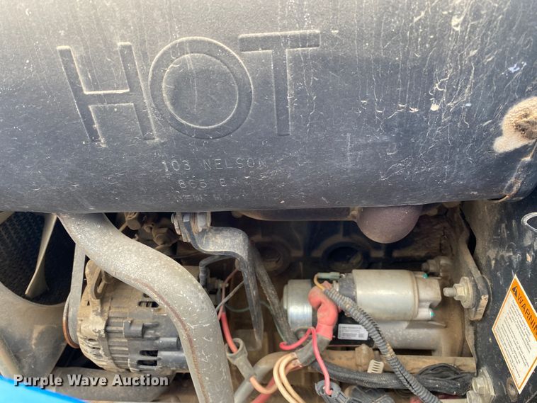 image for item JL9074 2003 New Holland TC335  MFWD tractor