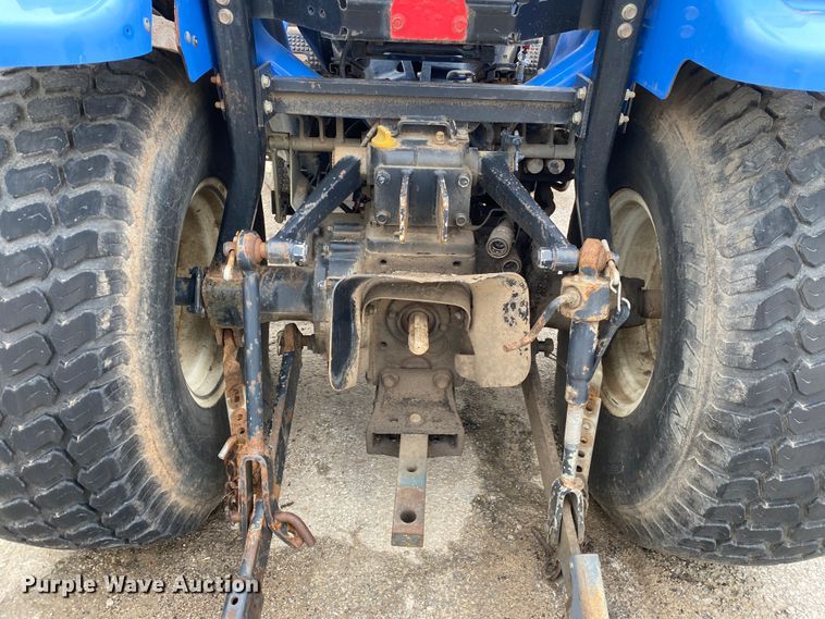 image for item JL9074 2003 New Holland TC335  MFWD tractor