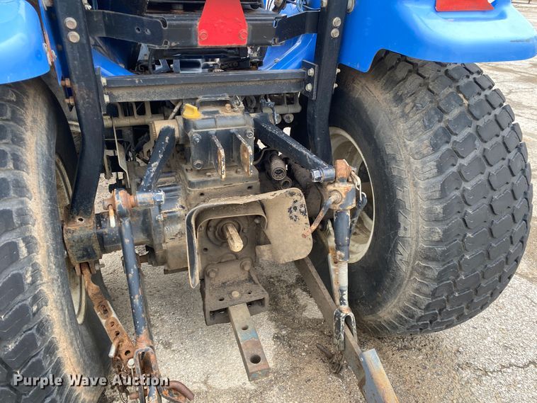 image for item JL9074 2003 New Holland TC335  MFWD tractor