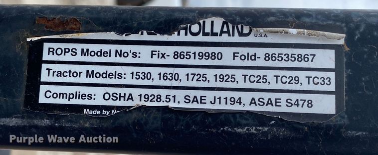 image for item JL9074 2003 New Holland TC335  MFWD tractor