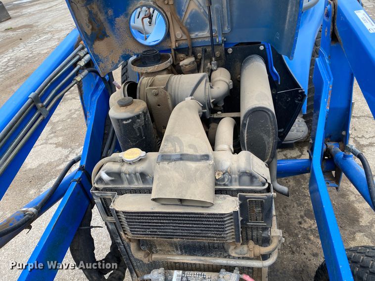 image for item JL9074 2003 New Holland TC335  MFWD tractor