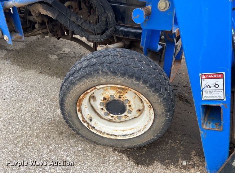 image for item JL9074 2003 New Holland TC335  MFWD tractor