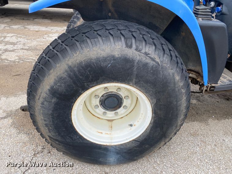 image for item JL9074 2003 New Holland TC335  MFWD tractor