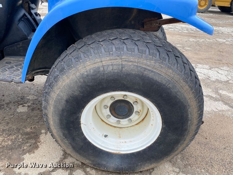 image for item JL9074 2003 New Holland TC335  MFWD tractor