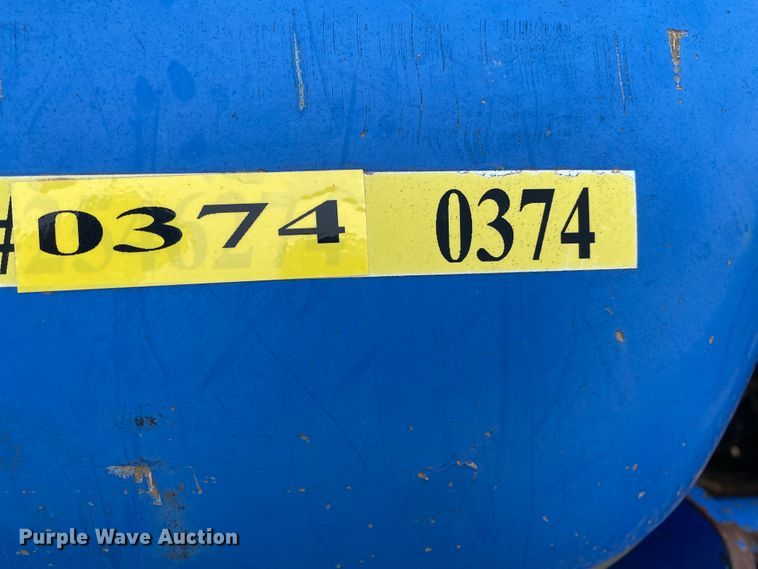 image for item JL9074 2003 New Holland TC335  MFWD tractor