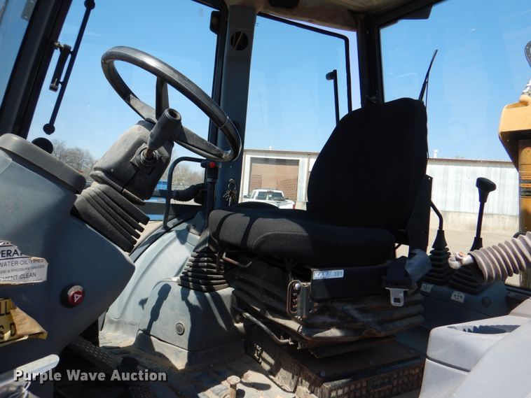 image for item JL9108 1997 New Holland 555E  backhoe