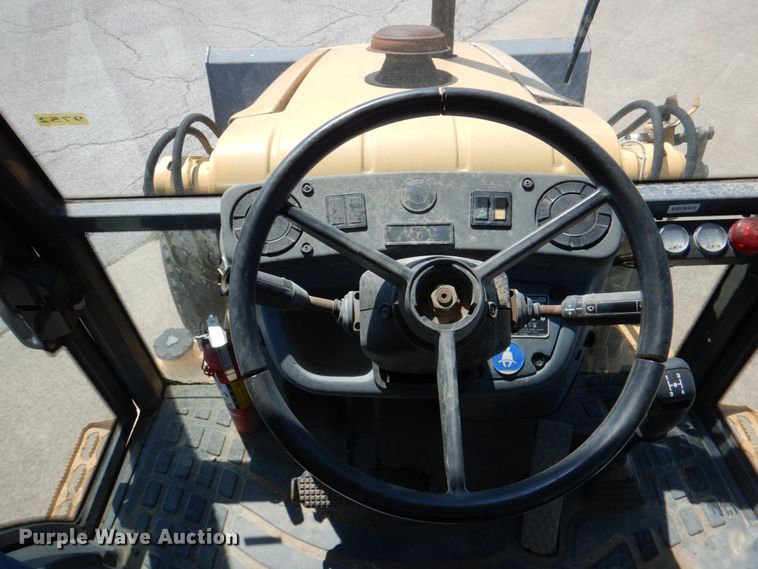 image for item JL9108 1997 New Holland 555E  backhoe