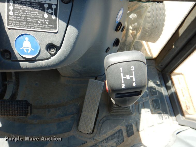 image for item JL9108 1997 New Holland 555E  backhoe