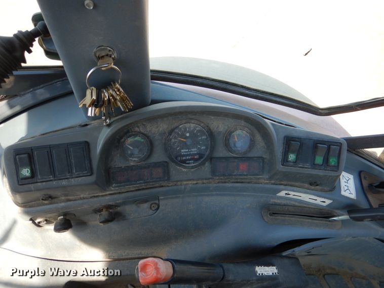 image for item JL9108 1997 New Holland 555E  backhoe