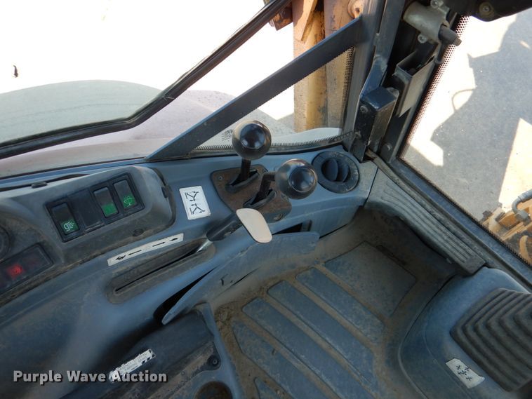 image for item JL9108 1997 New Holland 555E  backhoe