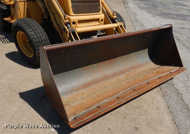 image for item JL9108 1997 New Holland 555E  backhoe