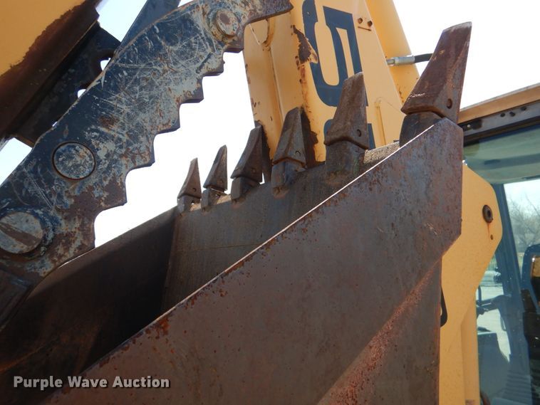 image for item JL9108 1997 New Holland 555E  backhoe