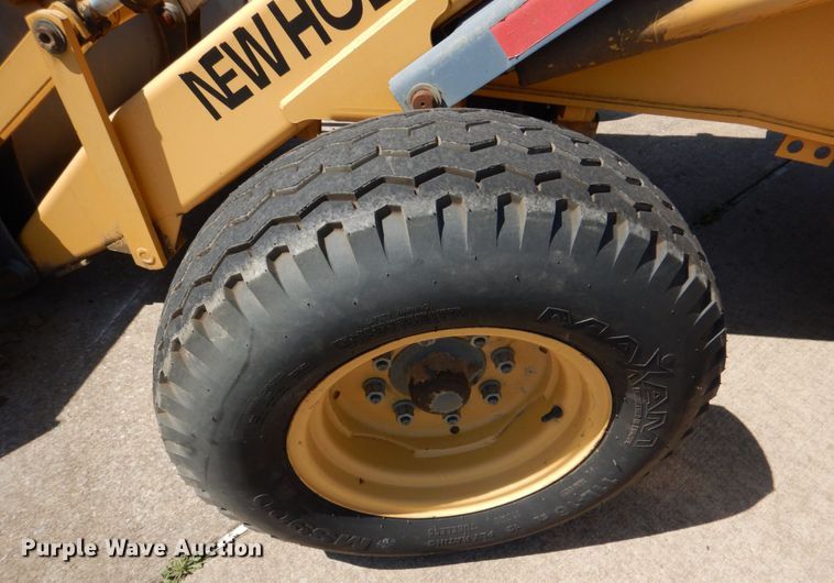 image for item JL9108 1997 New Holland 555E  backhoe