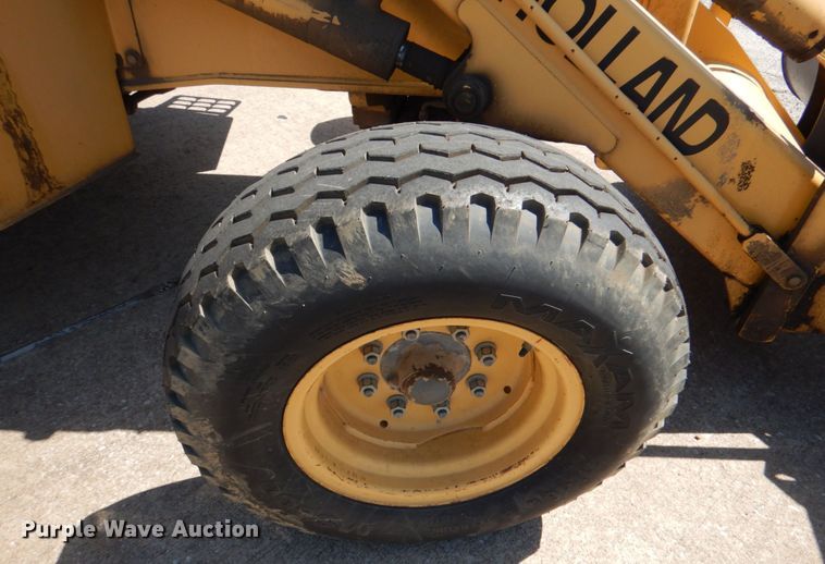 image for item JL9108 1997 New Holland 555E  backhoe