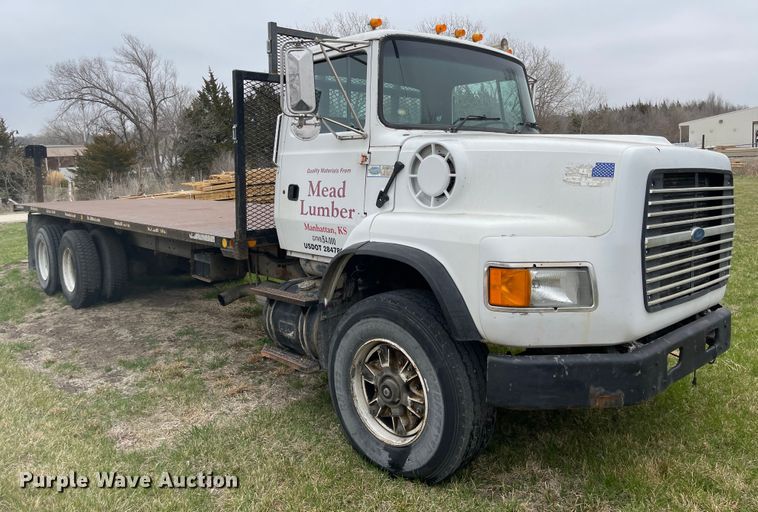 image for item FV9436 1997 Ford LTLS9000  flatbed truck