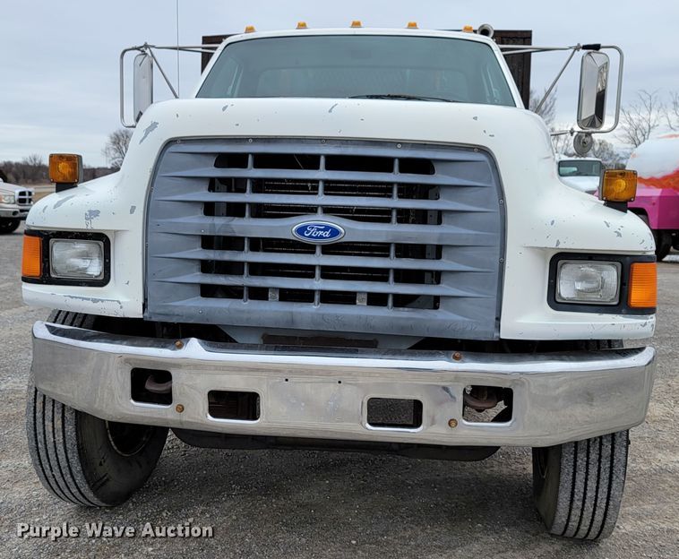 image for item HF9320 1995 Ford F700  dump flatbed truck