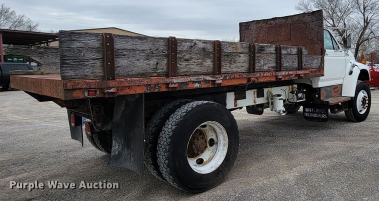 image for item HF9320 1995 Ford F700  dump flatbed truck