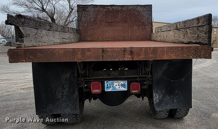 image for item HF9320 1995 Ford F700  dump flatbed truck