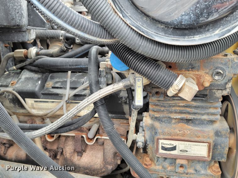 image for item HF9320 1995 Ford F700  dump flatbed truck