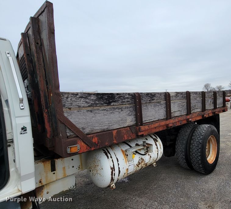 image for item HF9320 1995 Ford F700  dump flatbed truck