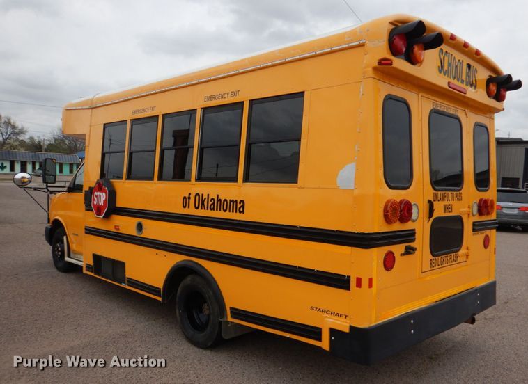 image for item JS9543 2011 GMC Savana  school bus