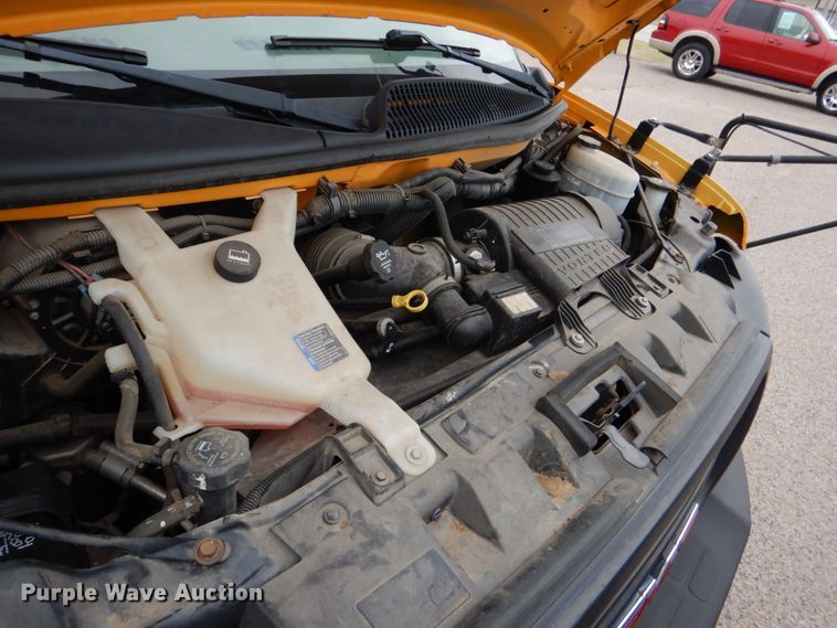 image for item JS9543 2011 GMC Savana  school bus