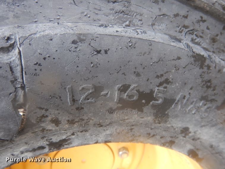 image for item DJ1298 2003 John Deere 250 skid steer loader