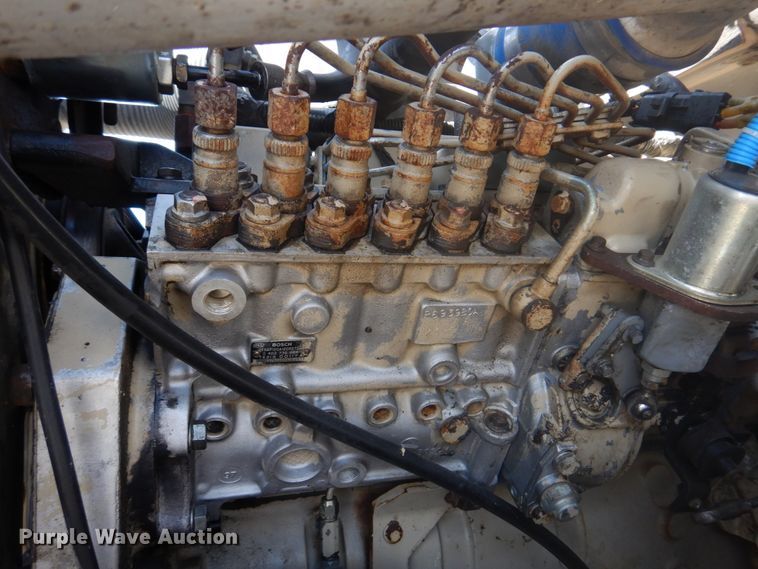 image for item DM7258 1996 Ford F800  dump flatbed truck