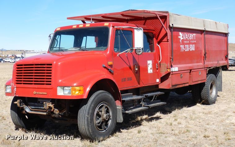 image for item DR1147 1990 International 4700  Crew Cab chipper truck