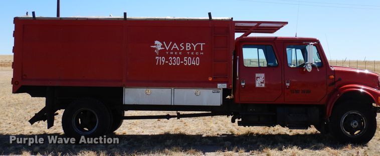 image for item DR1147 1990 International 4700  Crew Cab chipper truck