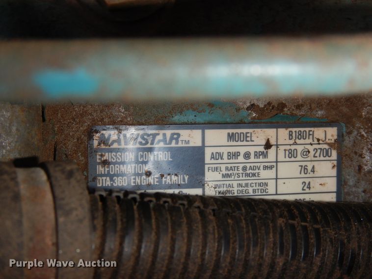 image for item DR1147 1990 International 4700  Crew Cab chipper truck